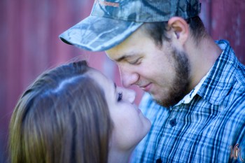 Kelly and Isaac 028 Barn Kiss